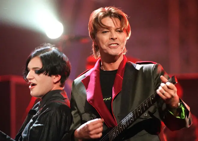 David Bowie and Brian Molko of Placebo performing at the Brit Awards in 1999