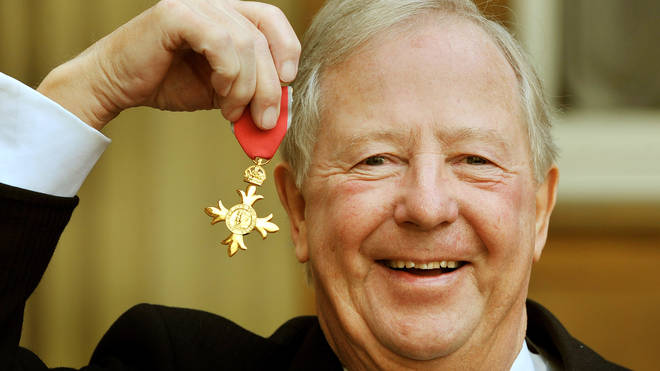 Tim Brooke-Taylor with his OBE in 2011