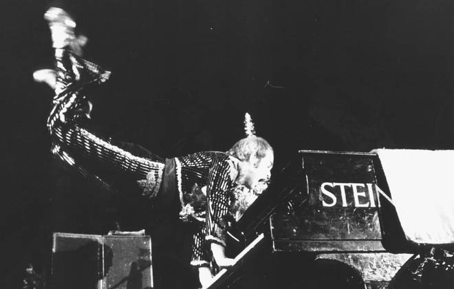 Elton John recreating his famous levitating act from the Troubadour at the Christmas Show in Hammersmith in 1974
