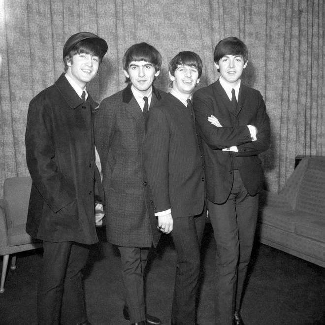 John Lennon [far left] and his bandmates in The Beatles