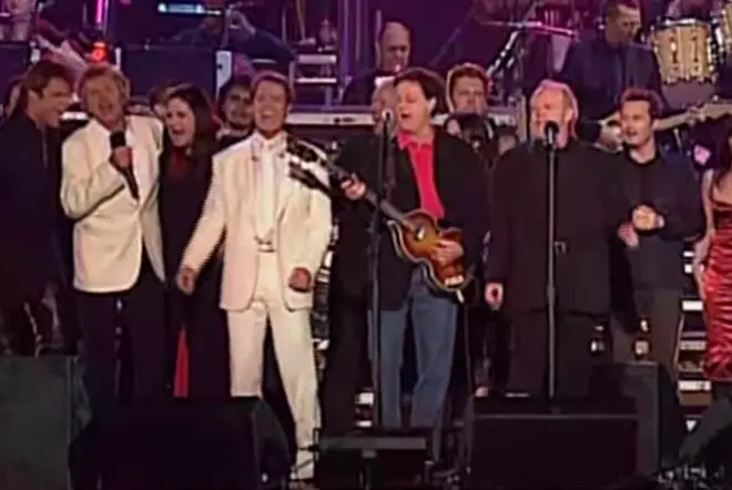 Brian May, Roger Taylor, Paul McCartney, Rod Stewart were joined by Phil Collins, Brian Wilson, Cliff Richard and Joe Cocker for an epic rendition of the Beatles classic 'All You Need Is Love', on June 4, 2002.