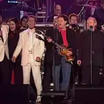 Brian May, Roger Taylor, Paul McCartney, Rod Stewart were joined by Phil Collins, Brian Wilson, Cliff Richard and Joe Cocker for an epic rendition of the Beatles classic 'All You Need Is Love', on June 4, 2002.