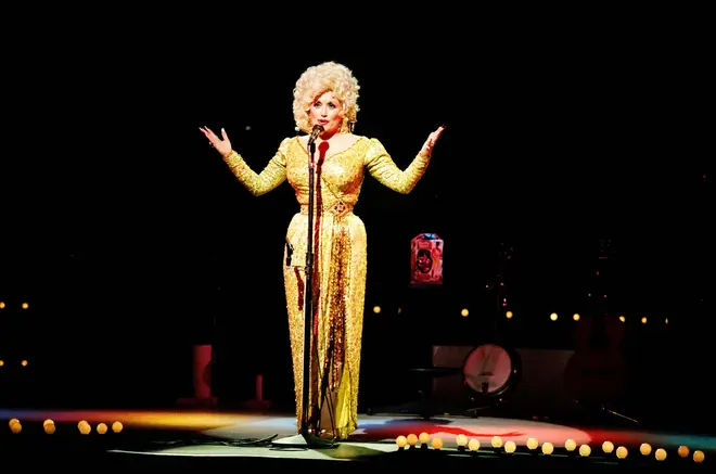 The video comes after Dolly Parton recently opened up about a clash she had with Elvis Presley which left her "crying all night". Pictured, on stage at The Dominion Theatre in 1983.