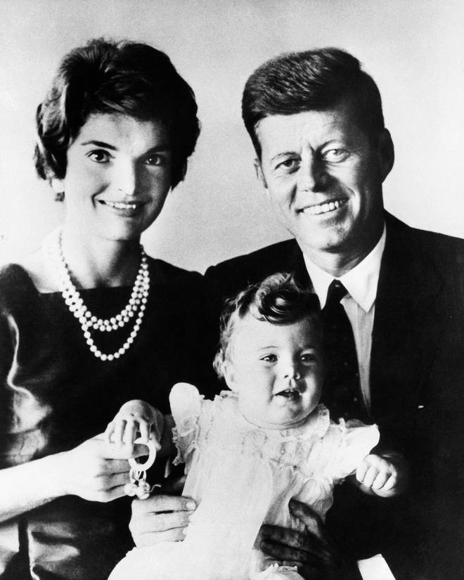 John F. Kennedy with his wife, Jackie, and their daughter, Caroline