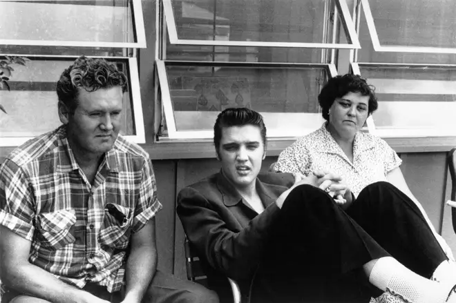 Elvis Presley with his parents Vernon and Gladys