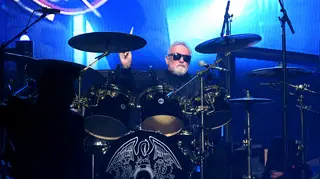 Roger Taylor performing with Queen