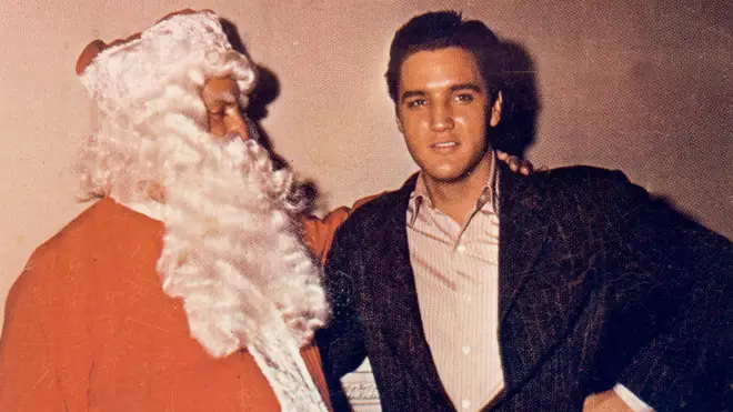 Elvis Presley and Colonel Tom Parker as Santa