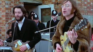 The police interrupt The Beatles last live performance