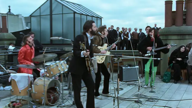 The Beatles up on the roof