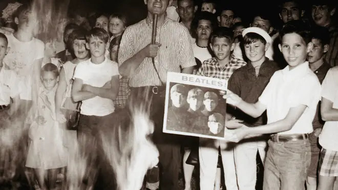 The Beatles records being burned at a protest