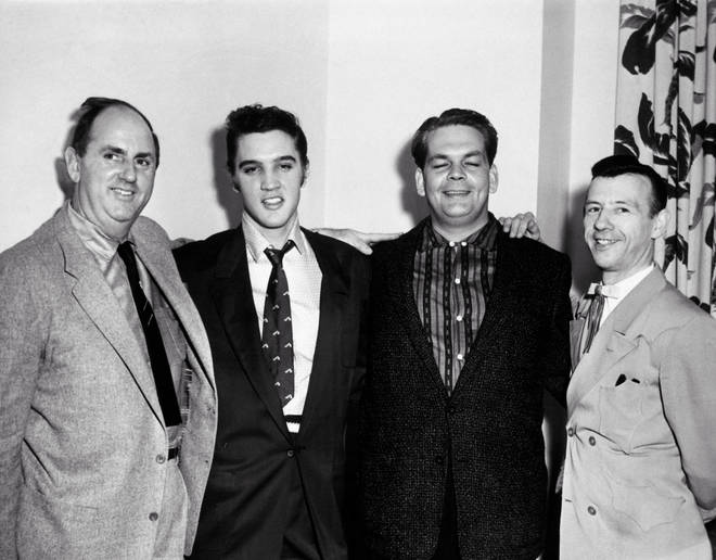 Elvis Presley (and Colonel Tom Parker) signs for RCA Victor