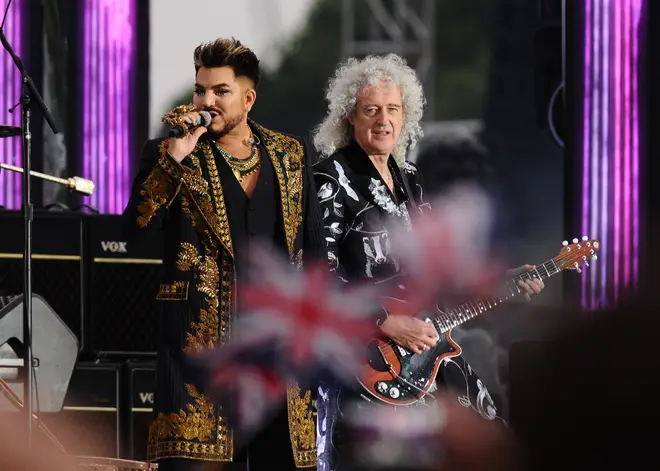 Brian May and Adam Lambert performing 'We Will Rock You' at Queen Elizabeth's Platinum Jubilee party at the palace. (Photo by Kerry Davies - WPA Pool/Getty Images)