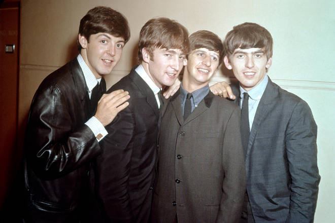 The Beatles pose for a portrait in 1963. (Photo by Michael Ochs Archives/Getty Images)