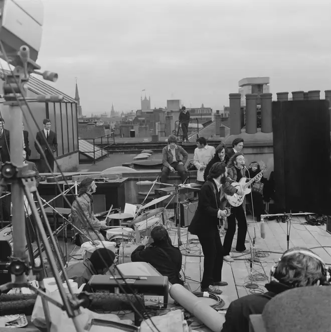 The Beatles perform on the rooftop of Apple's London office on Savile Row