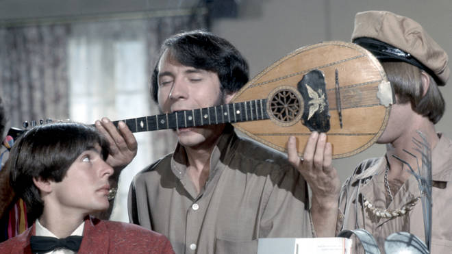 The Monkees getting to grips with their instruments
