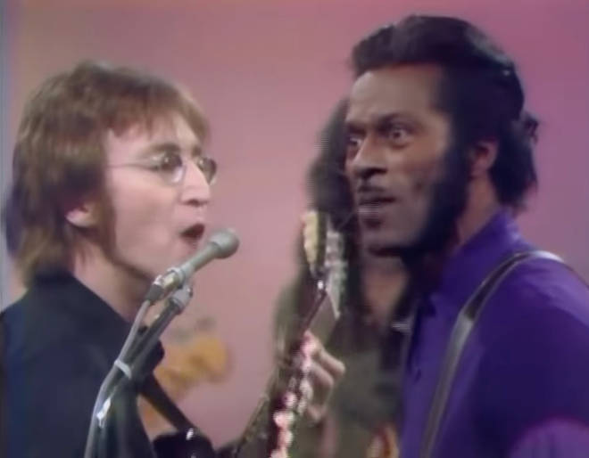 John Lennon and a surprised Chuck Berry