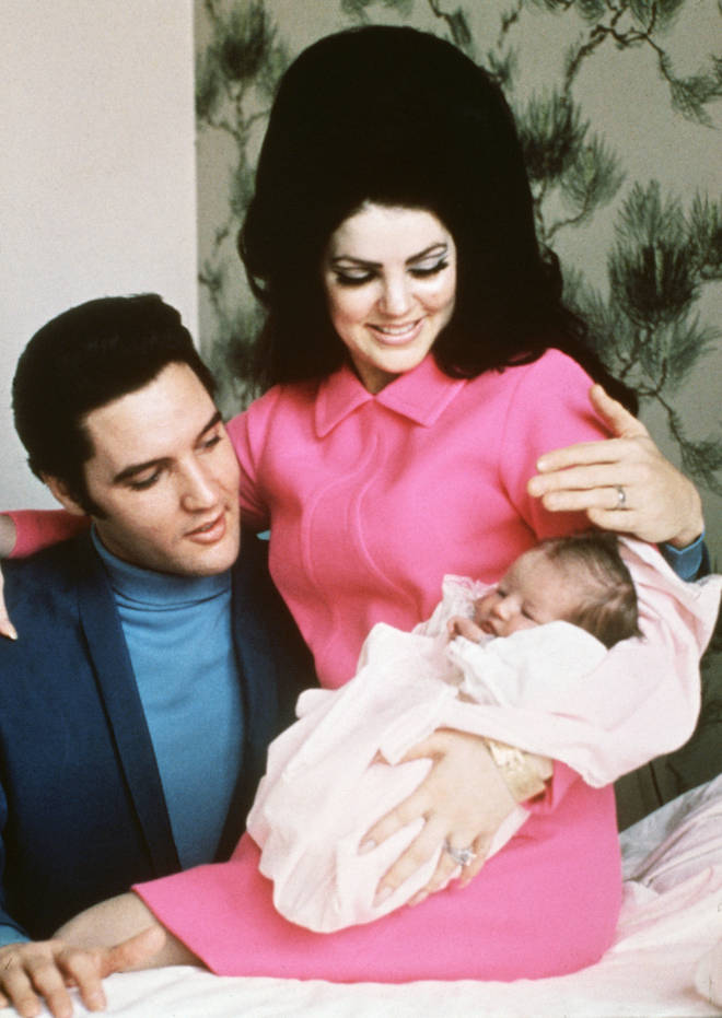 Elvis Presley with Priscilla and baby Lisa Marie in 1968
