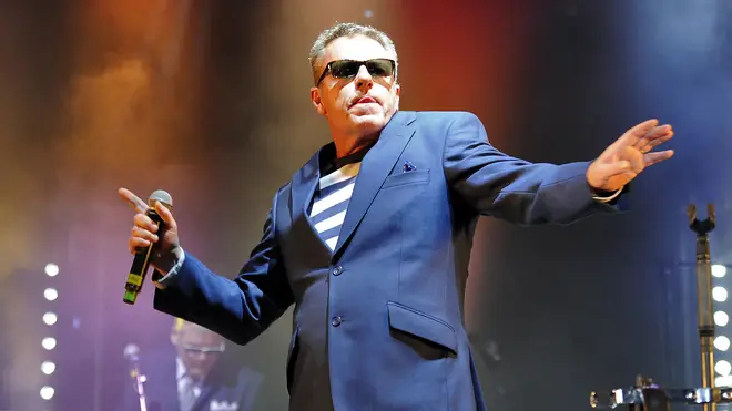Suggs performing with Madness