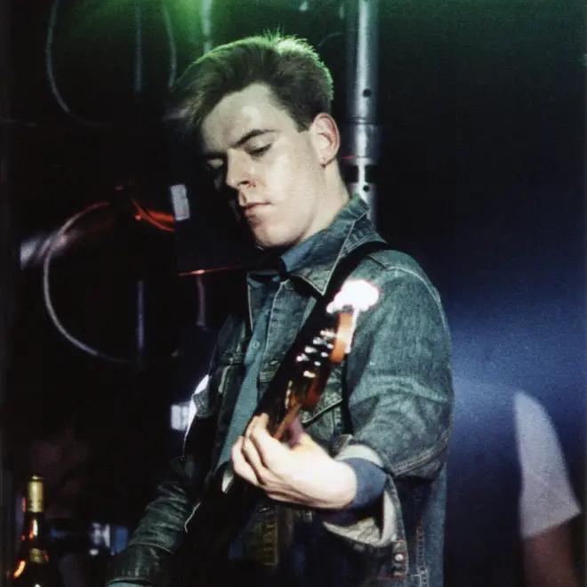 Andy Rourke playing with The Smiths in 1984