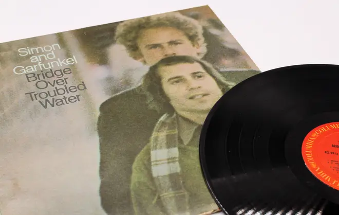 Folk rock singers, Simon and Garfunkel, music album on vinyl record LP disc titled bridge over troubled water. Paul Simon and Art Garfunkel album cove