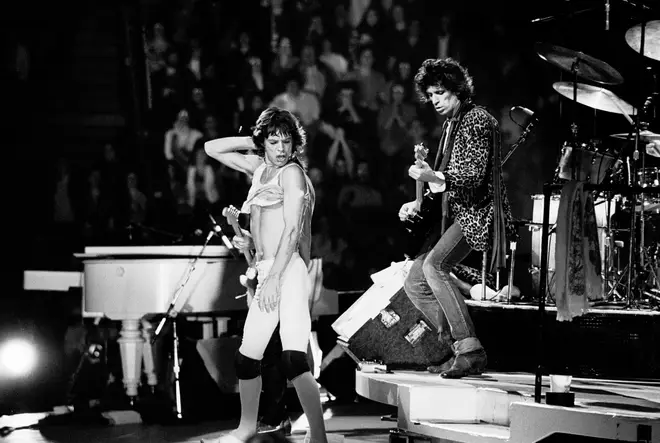 Mick Jagger and Keith Richards on stage in 1981. (Photo by Gary Gershoff/Getty Images)
