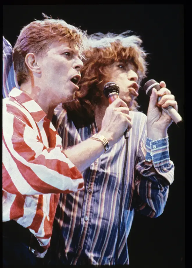David Bowie and Mick Jagger performing on stage at The Prince's Trust 10th Birthday Party at Wembley Arena, London, United Kingdom on 20th June 1986. (Photo by Brian Cooke/Redferns)