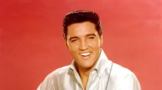 Elvis Presley portrait with acoustic guitar