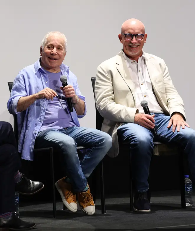 Paul Simon (sat beside documentary film-maker Alex Gibney) opened up about his hearing loss at a recent Q&A. (Photo by Brian de Rivera Simon/Getty Images)