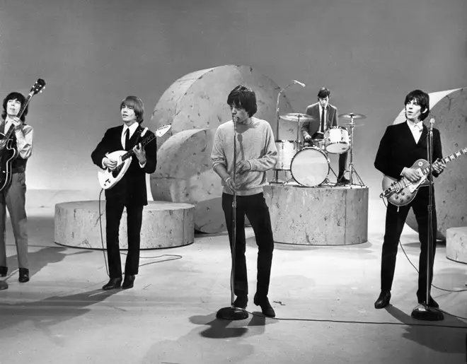 The Rolling Stones performing on The Ed Sullivan Show in 1964. (Photo by Michael Ochs Archives/Getty Images)