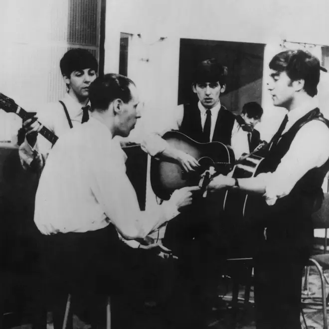 The Beatles in 1963 (with Ringo Starr) with George Martin in the studio
