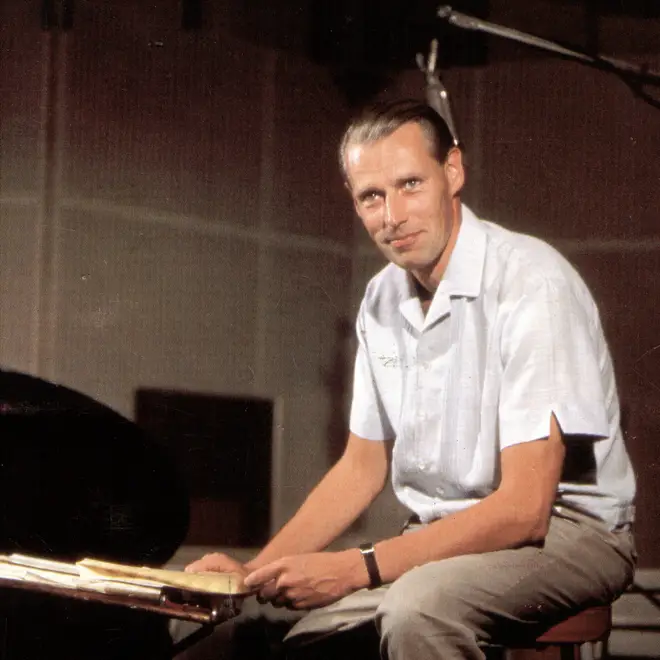 George Martin doing his thing – without a tie