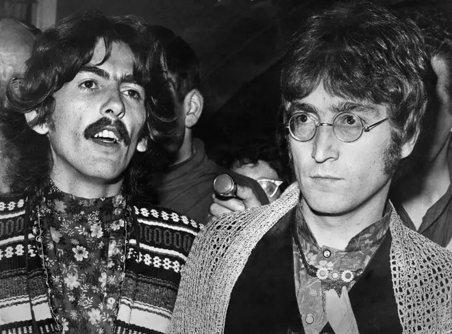 George Harrison and John Lennon in 1967. (Photo by Stephen Shakeshaft/Mirrorpix via Getty Images)