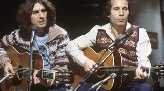 George Harrison performed alongside his dear friend Paul Simon on Saturday Night Live in 1976. (Photo by Richard E. Aaron/Redferns)