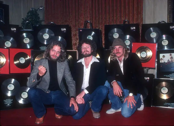 The Eagles' Don Felder, Don Henley, and Joe Walsh posing with gold records in 1978. (Photo by Michael Ochs Archives/Getty Images)