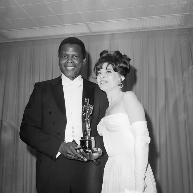 Sidney Poitier presented with his Oscar by Anne Bancroft