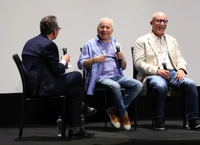 Paul Simon and director Alex Gibney talking about the documentary, In Restless Dreams: The Music of Paul Simon. (Photo by Brian de Rivera Simon/Getty Images)