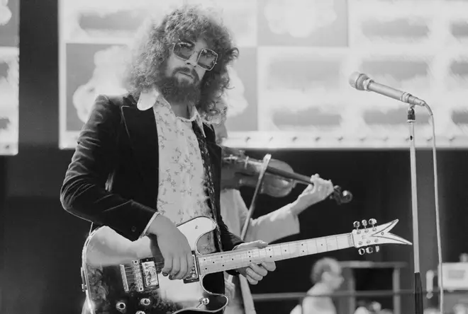 Wearing sunglasses has been Jeff Lynne's trademark since the early days of Electric Light Orchestra. (Photo by Michael Putland/Getty Images)