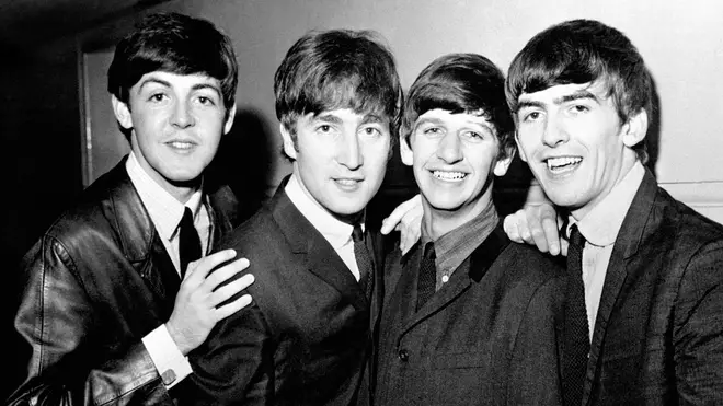 The Beatles photographed in 1965 around the time they met Elvis Presley